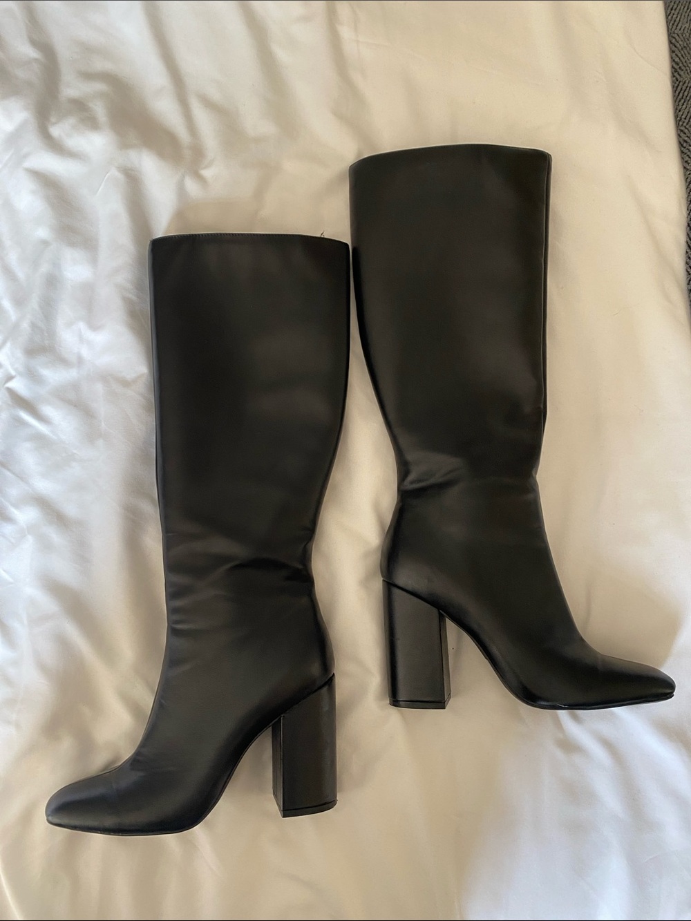 Tall black boots